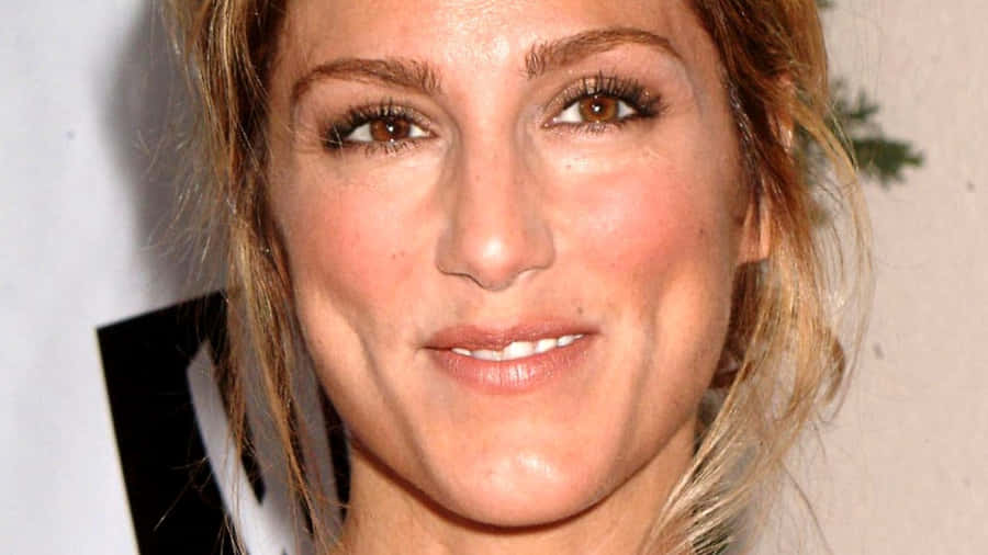 Resplendent Jennifer Esposito At A Celebrity Event Wallpaper