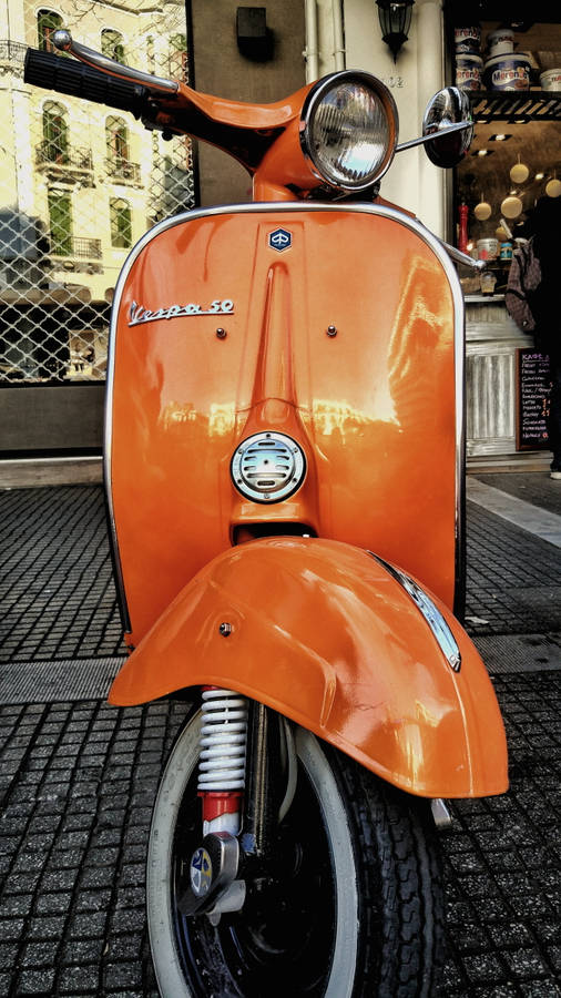 Retro Aesthetic Orange Vespa 50 Wallpaper