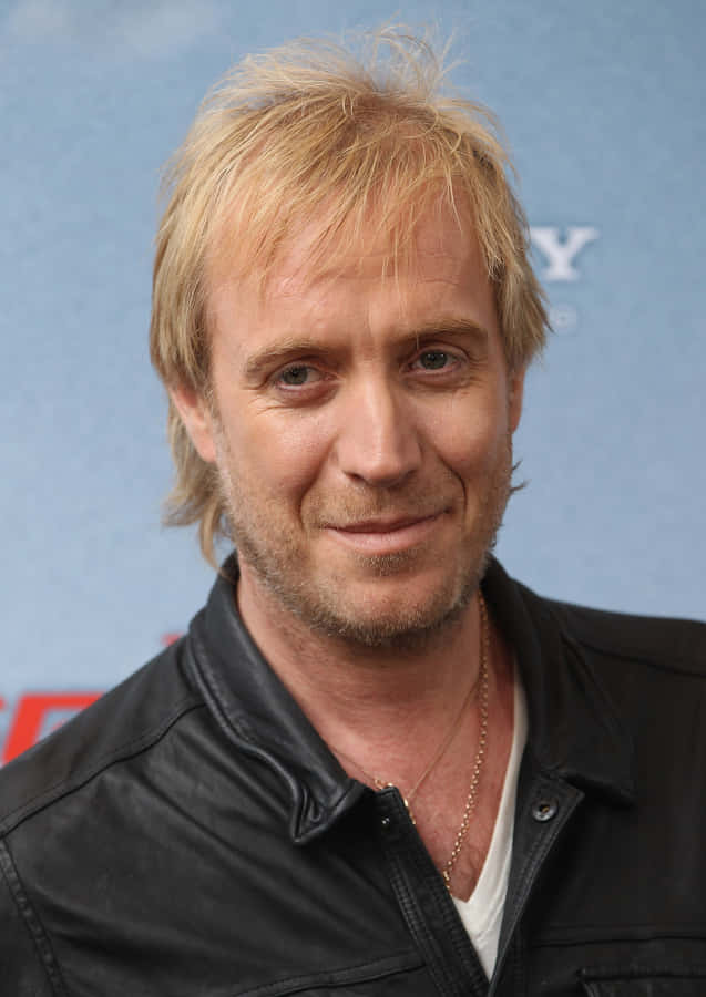 Rhys Ifans Striking A Pose Wallpaper