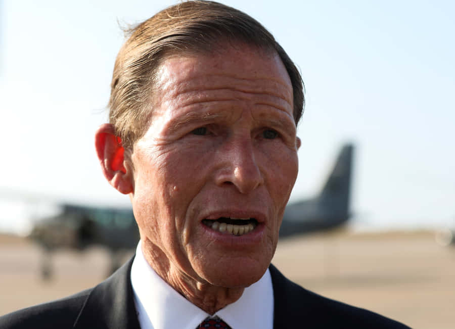 Richard Blumenthal Outside An Airplane Wallpaper