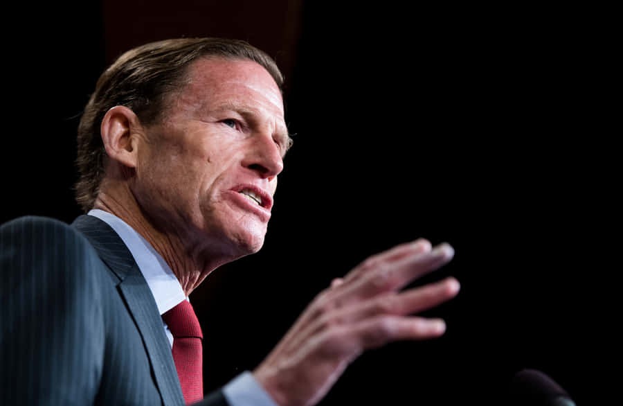Richard Blumenthal Posing Against Black Backdrop Wallpaper