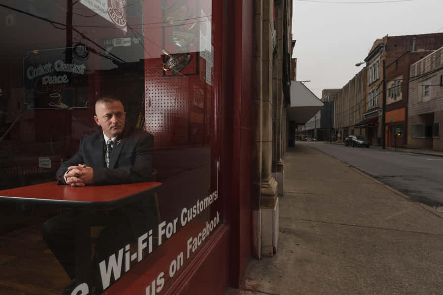 Richard Ojeda Looking Out From Window Wallpaper