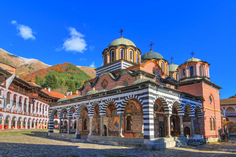 Rila Monastery Beneath The Blue Sky Wallpaper