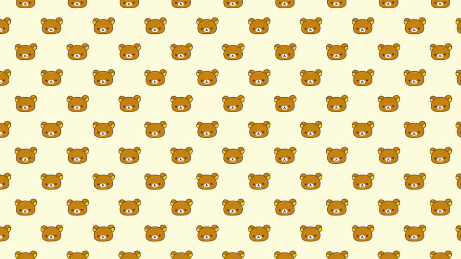 Rilakkuma Sitting Comfortably On A Laptop Wallpaper