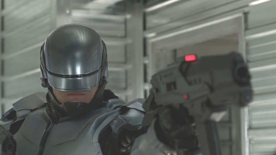 Robocop Pointing Gun Wallpaper