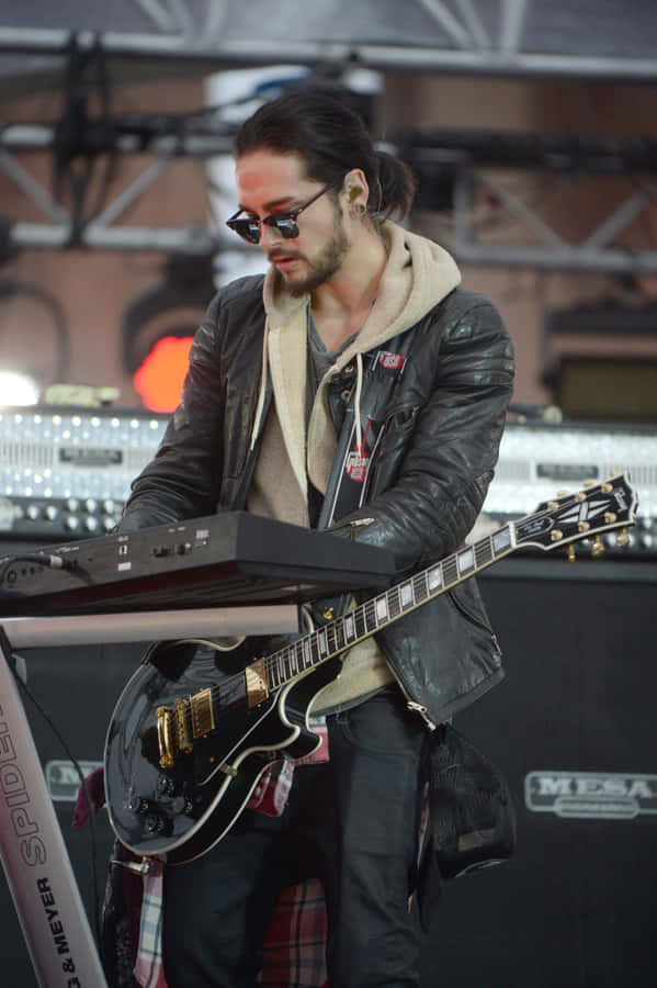 Rock Guitarist Performance Outdoor Stage Wallpaper