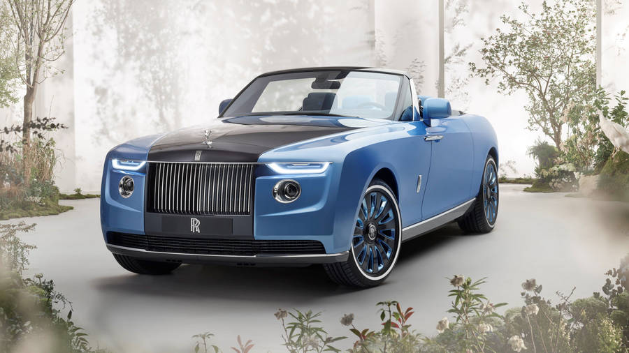 Rolls-royce 4k Blue And Black Dawn With Shrubs Wallpaper