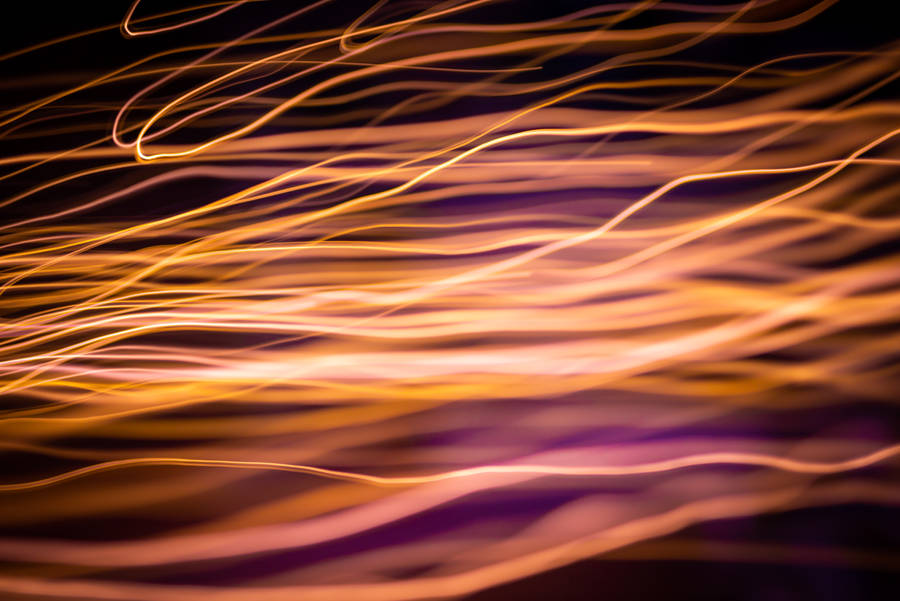 Rose Gold Fire In The Dark Wallpaper