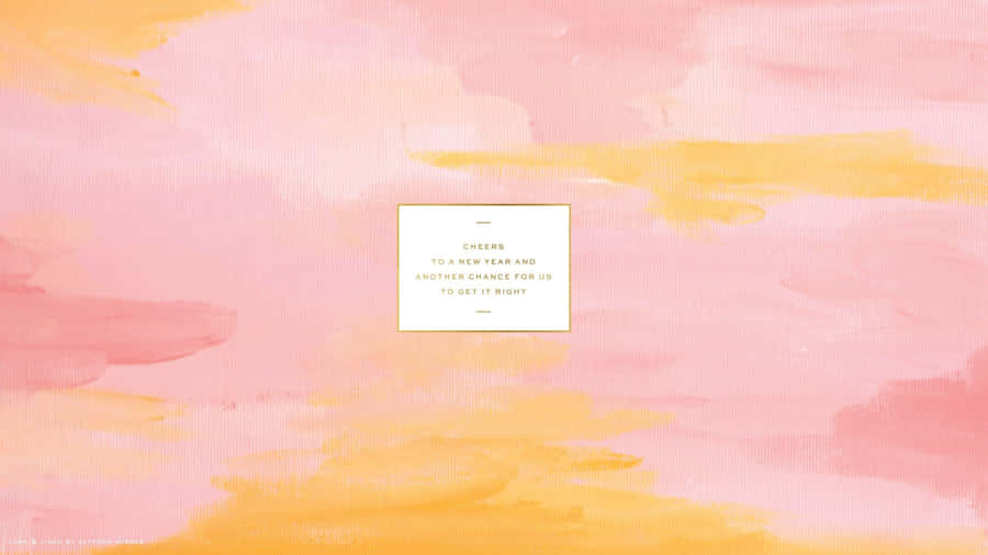 Rose Gold Laptop On A Desk Wallpaper