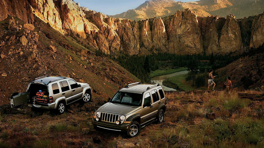 Rugged Jeep Liberty Conquering The Wilderness Wallpaper