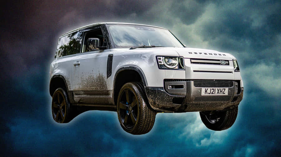 Rugged Off-road Adventure With Land Rover Defender Wallpaper