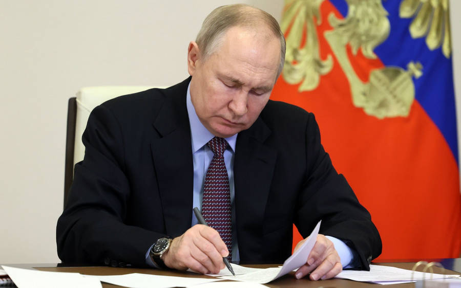 Russian President Vladimir Putin Signing Official Documents Wallpaper