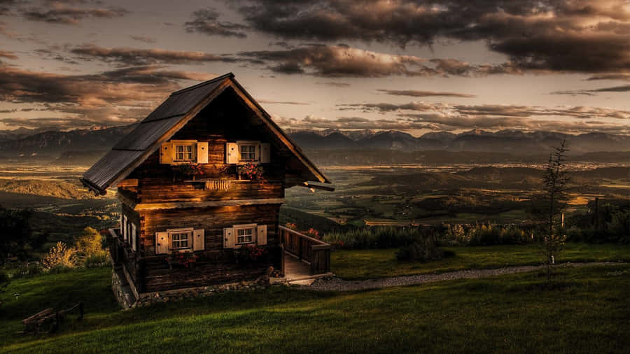 Rustic Cabin At Sunset Wallpaper