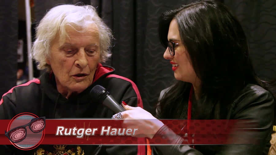 Rutger Hauer Being Interviewed Wallpaper
