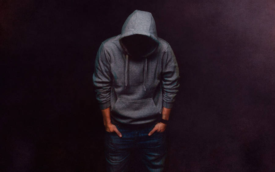 Sad Guy In A Gray Hoodie Wallpaper