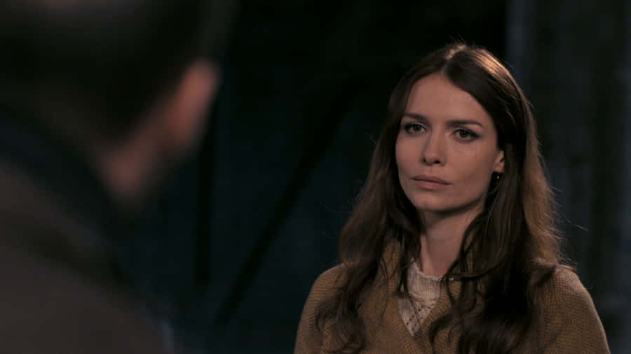 Saffron Burrows Striking A Pose In A Stylish Outfit Wallpaper