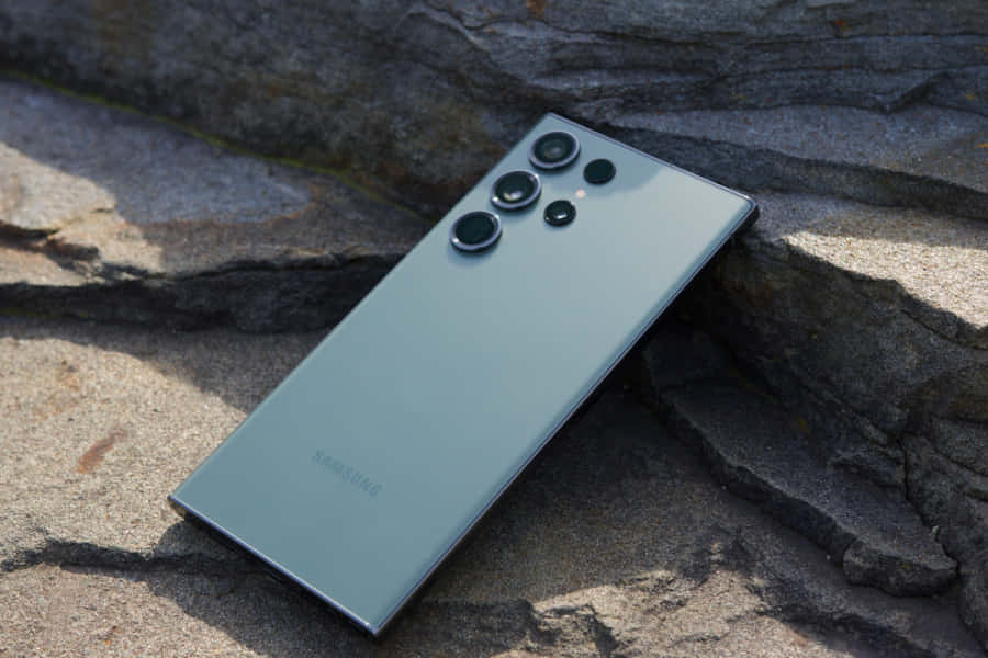 Samsung S23 Ultra On Rock Surface Wallpaper