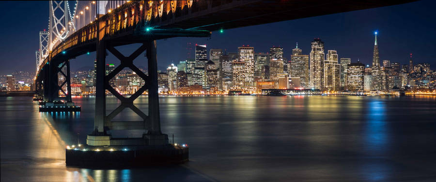 San Francisco Skyline Under Bridge Wallpaper