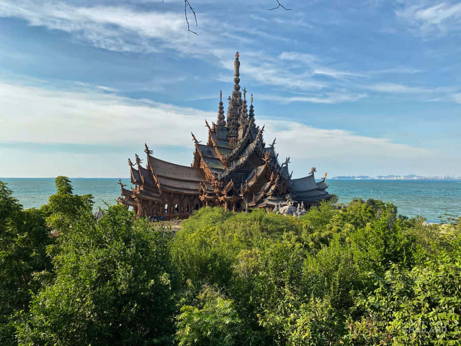 Sanctuary Of Truth Poking Out From The Forest Wallpaper