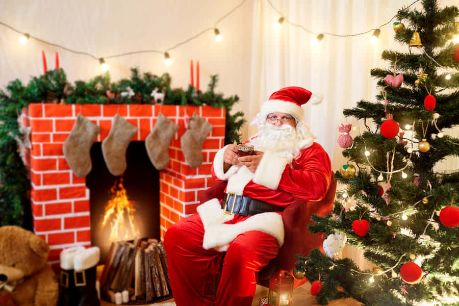 Santa Relaxingby Christmas Fireplace Wallpaper