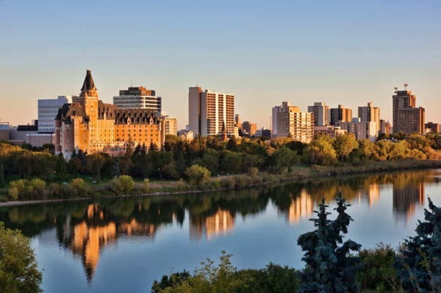 Scenic View Of Saskatoon Cityscape At Sunset Wallpaper