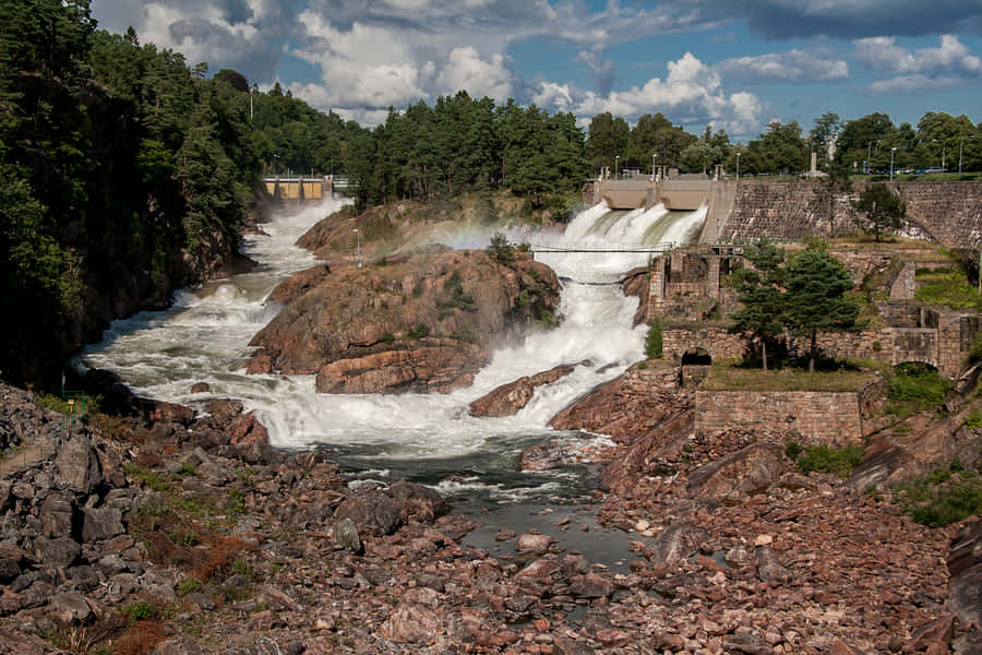 Scenic View Of Tranquil Trollhattan Waterfall Wallpaper