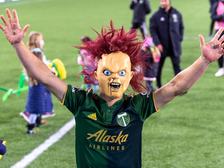 Sebastian Blanco Wearing A Chucky Mask Wallpaper