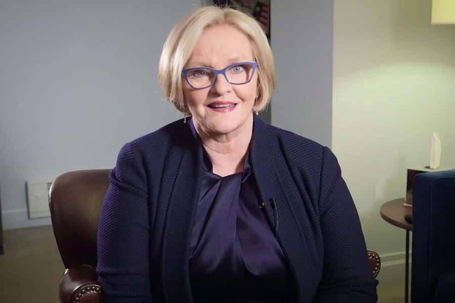 Senator Claire Mccaskill Sitting On An Armchair Wallpaper