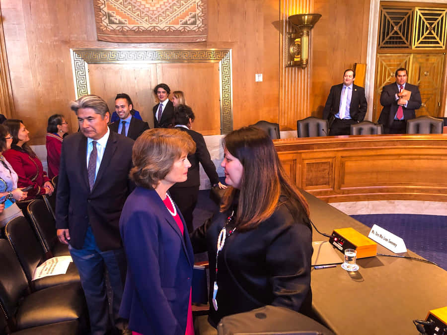 Senator Lisa Murkowski In A Thoughtful Conversation Wallpaper