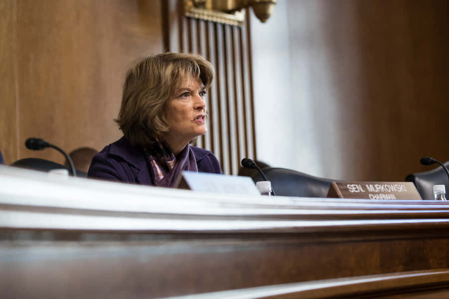 Senator Lisa Murkowski Speaking At Committee Meeting Wallpaper