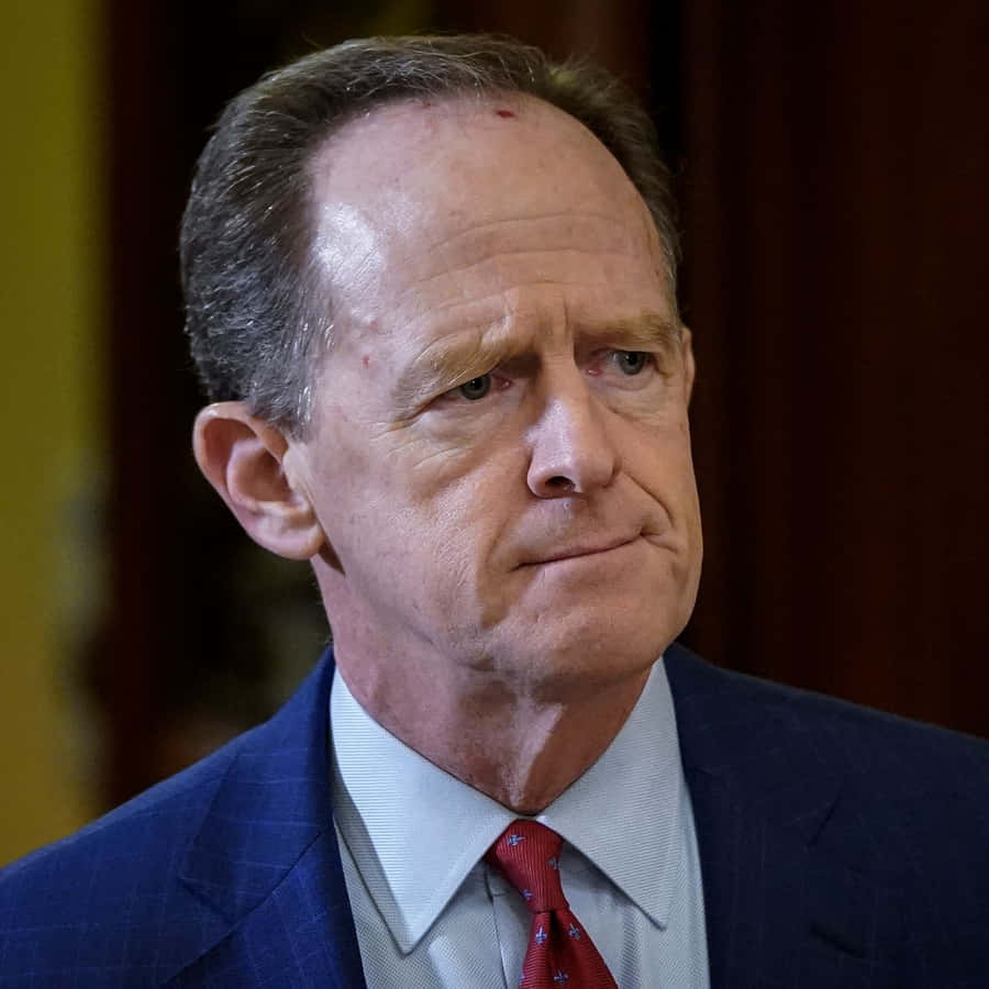 Senator Pat Toomey With A Serious Expression Wallpaper