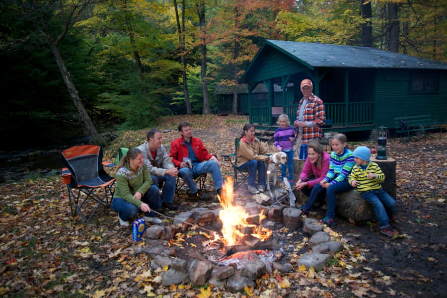 Serene Fall Camping Experience Wallpaper