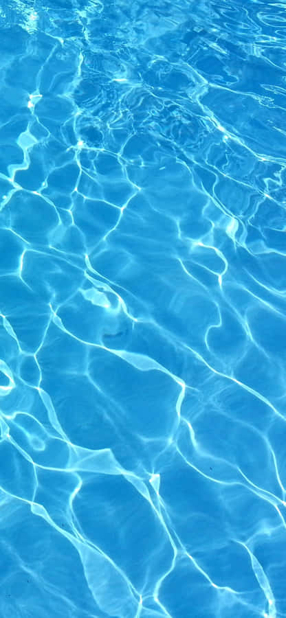 Serene Light Blue Pool Water Wallpaper
