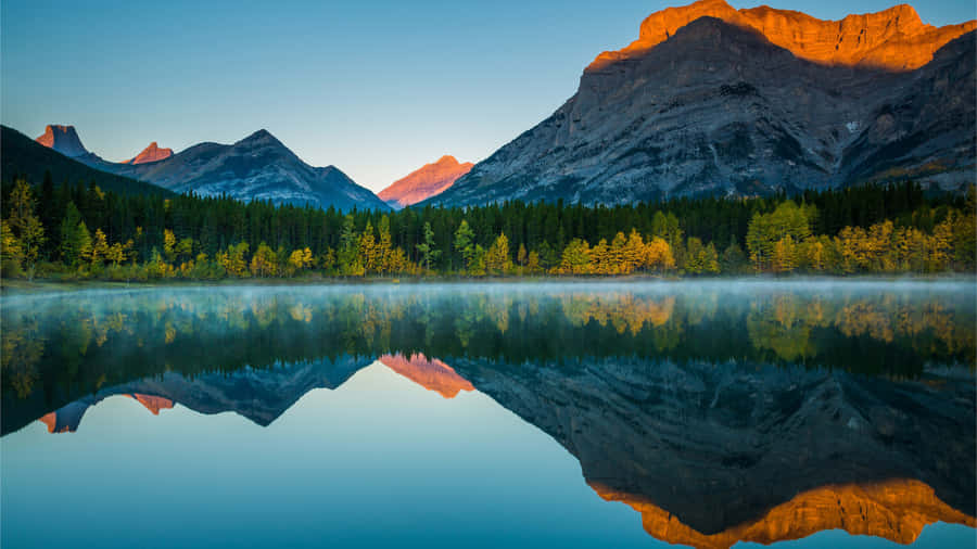 Serene Mountain Lake Sunrise Reflection4 K Wallpaper