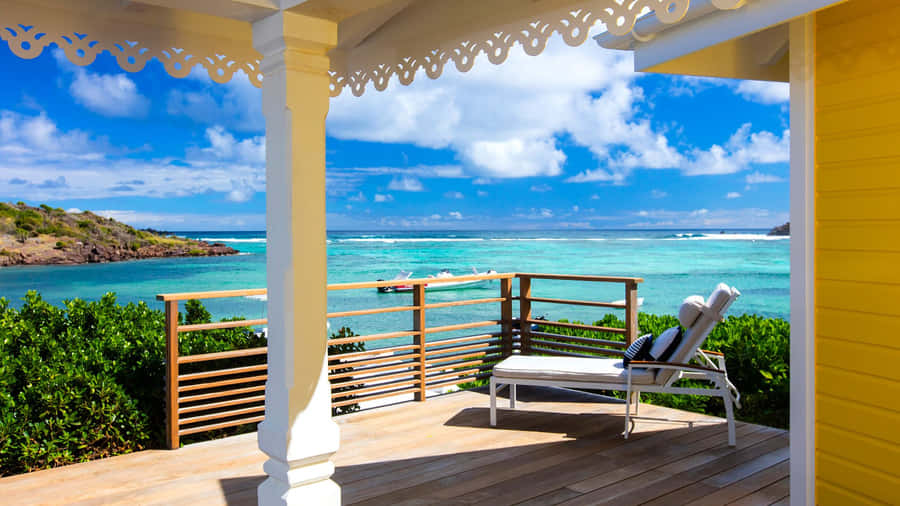 Serene Sunrise At Tropical Beach Resort Wallpaper