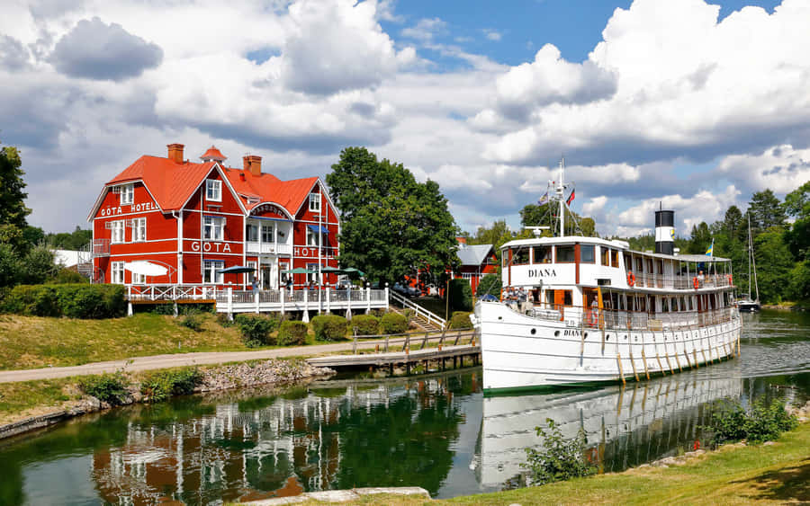Serene Sunset View Over Norrköping Wallpaper