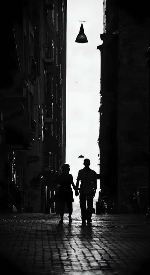 Shadowed Lovers Walk Wallpaper