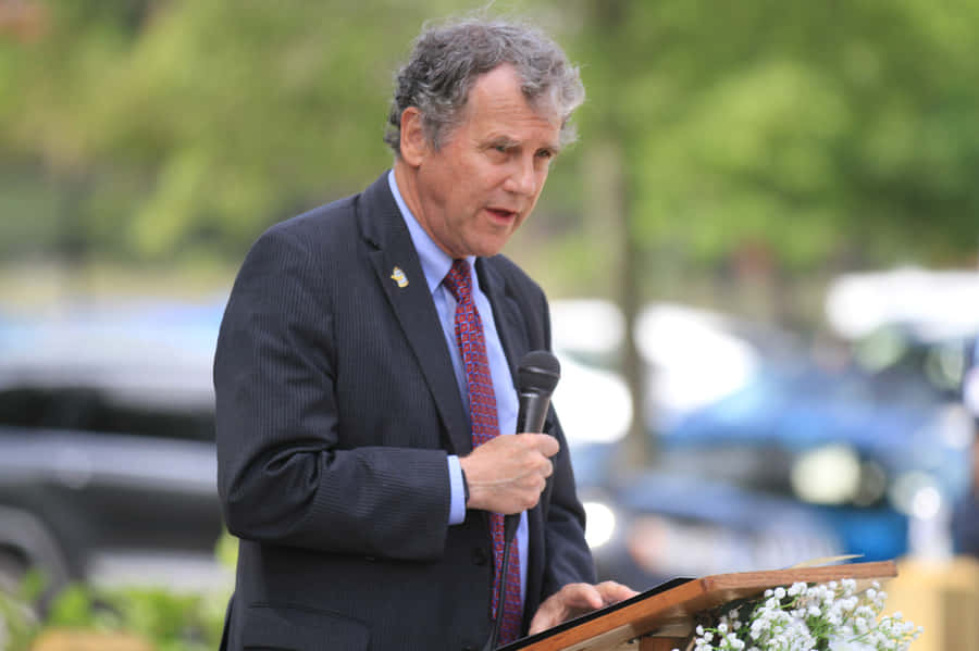 Sherrod Brown Delivering A Public Speech Wallpaper