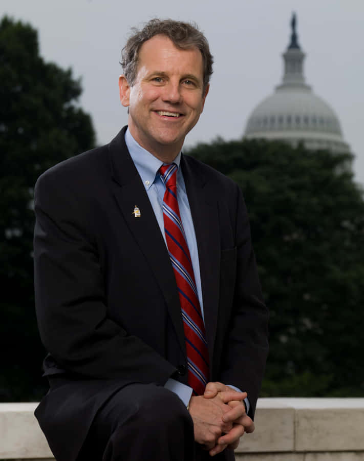 Sherrod Brown With Capitol Dome Wallpaper