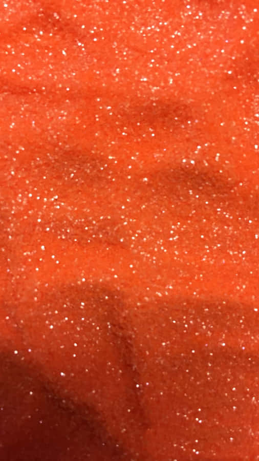 Shine Bright With Orange Glitter Wallpaper