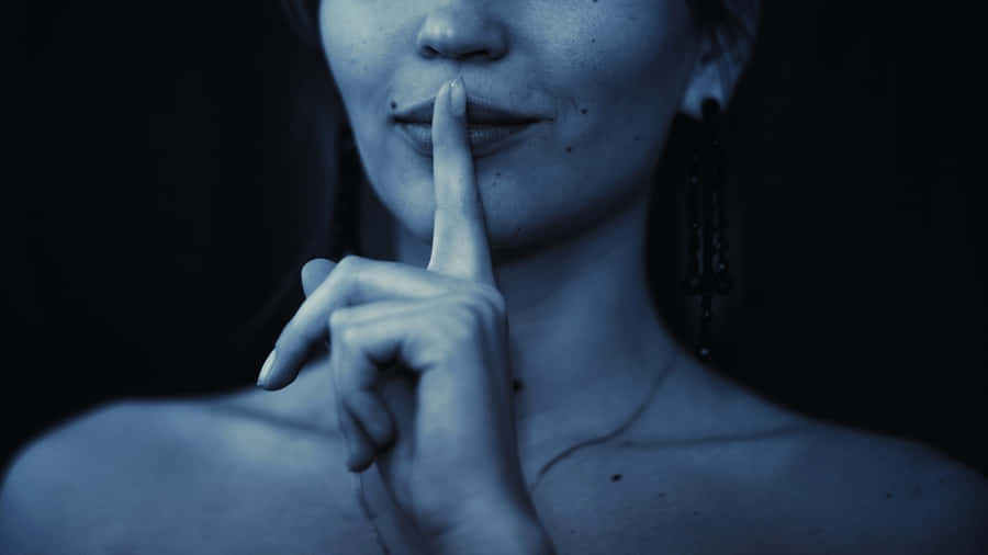 Silent Gesture For Secrecy Wallpaper
