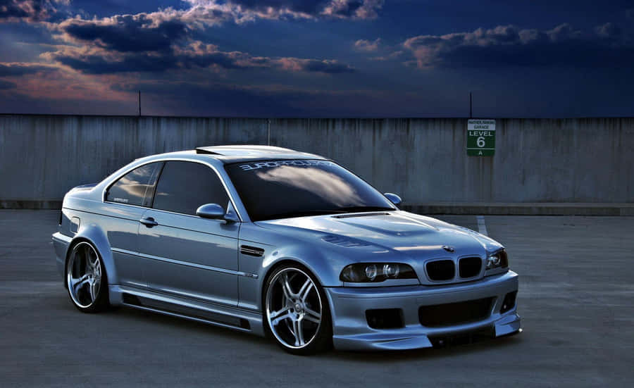 Silver B M W E46 Coupe Sunset Parking Lot Wallpaper