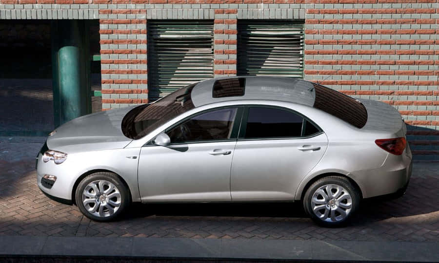 Silver M G550 Sedan Parked Wallpaper