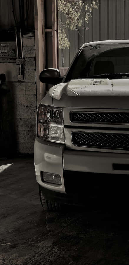 Silver Pickup Truck Garage Scene Wallpaper