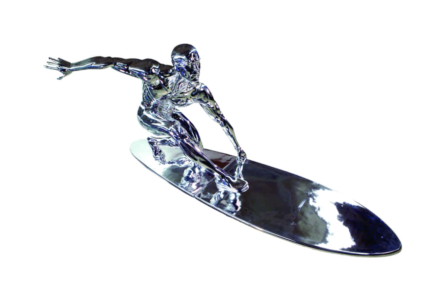 Silver Surfer Figurine On Surfboard Wallpaper