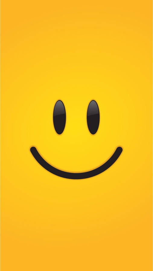 Simple Smiley Face On Yellow Background Wallpaper
