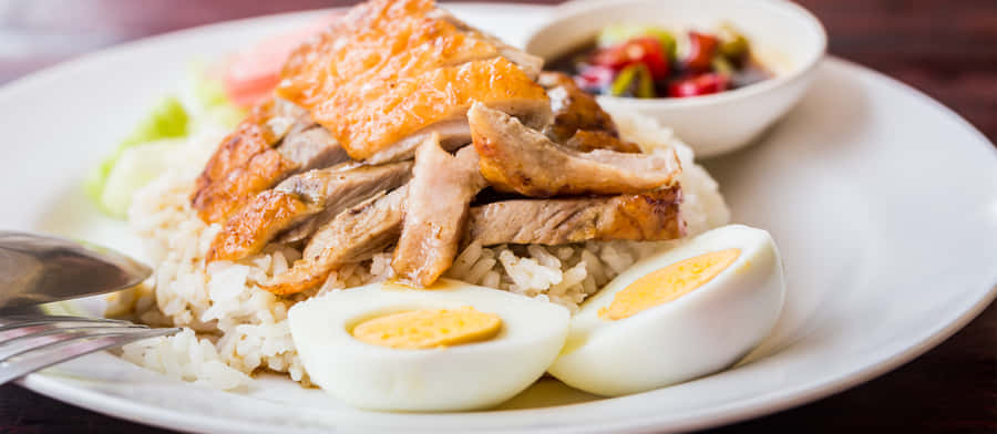 Singaporean Duck Rice With Egg - Dutch Angle Shot Wallpaper