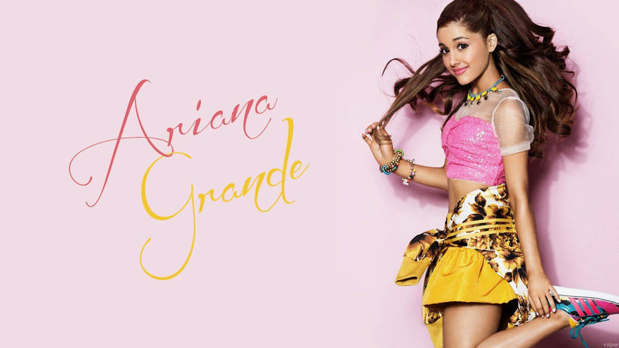 Singer And Songwriter Ariana Grande Brings Her Bright And Upbeat Energy To Life. Wallpaper