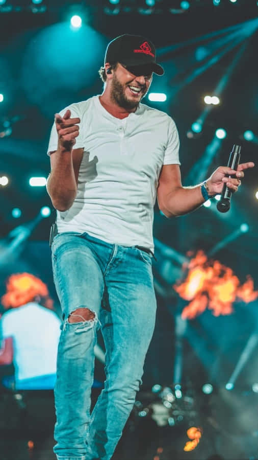 Singer Luke Bryan Gracing The Stage With His Powerful Vocals.