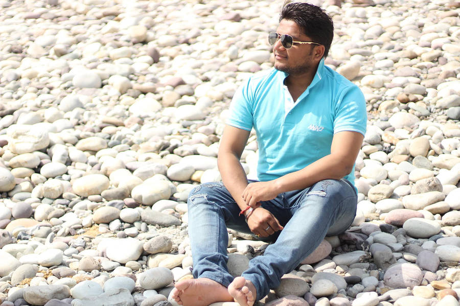 Single Boy On Rocks Wallpaper